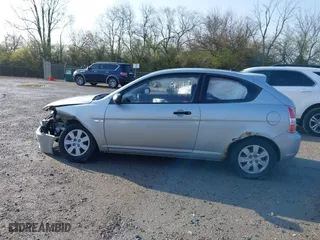 2010 Hyundai Accent GS with VIN KMHCM3AC2AU164786, listed as a IAAI auction lot 41995191 with 148,174 mi miles. Bid and sale history available at carsss.com. Image 14.