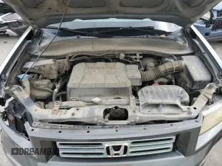 2008 Honda Ridgeline RTL z VIN 2HJYK16528H529507, wystawiony jako Copart lot #60049855 z przebiegiem 173 863 mil mil oraz Szkoda całkowita • Salvage title. Historia ofert i sprzedaży dostępna na DreamBid. Obrazek 11.