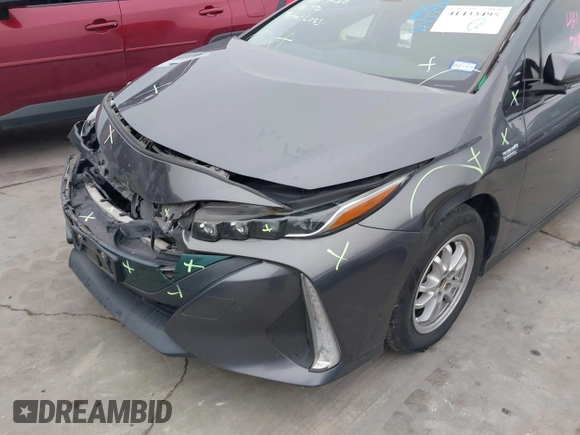 2018 Toyota Prius Plus with VIN JTDKARFPXJ3087064, listed as a IAAI auction lot 41433495 with 118,298 mi miles and . Bid and sale history available at DreamBid. Image 6.