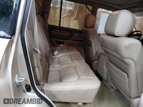 2001 Lexus LX 470 z VIN JTJHT00W213507042, wystawiony jako Copart lot #84236804 z przebiegiem 179 706 mil mil oraz Tytuł czysty. Historia ofert i sprzedaży dostępna na DreamBid. Obrazek 11.