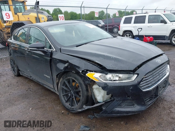 2014 Ford Fusion SE Hybrid with VIN 3FA6P0LU9ER310990, listed as a IAAI auction lot 42336303 with 197,588 mi miles and . Bid and sale history available at DreamBid. Image 1.