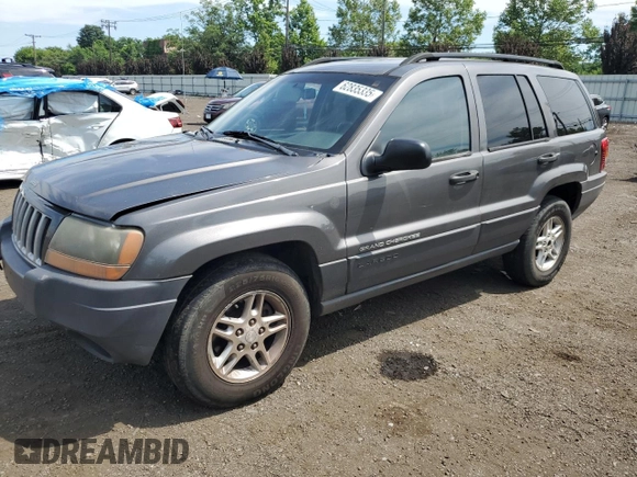 2004 Jeep Grand Cherokee Laredo with VIN 1J4GW48S64C291404, listed as a Copart auction lot 62835335 with 170,365 mi miles and Salvage title. Bid and sale history available at DreamBid. Image 1.