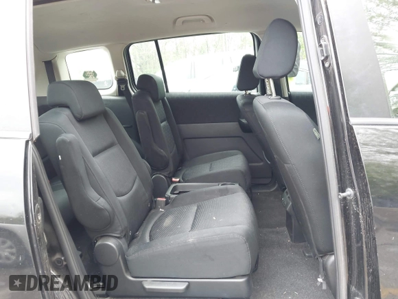 2010 Mazda 5 Sport with VIN JM1CR2W33A0360848, listed as a IAAI auction lot 42104824 with 151,084 mi miles and . Bid and sale history available at DreamBid. Image 8.