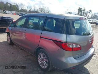 2012 Mazda 5 Sport with VIN JM1CW2BLXC0101310, listed as a IAAI auction lot 41207247 with 146,691 mi miles. Bid and sale history available at carsss.com. Image 3.