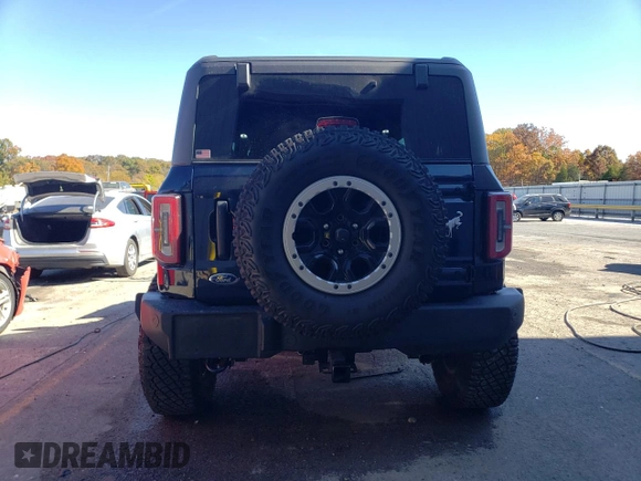 2021 Ford Bronco с VIN 1FMDE5CH0MLA60295, выставлен на аукционе Copart как лот 77109024 с пробегом 12 804 миль миль и Списание • Salvage title. История ставок и продаж доступна на DreamBid. Изображение 6.
