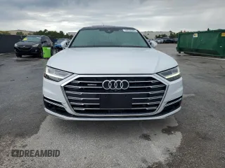 2019 Audi A8 z VIN WAU8DAF88KN004066, wystawiony jako Copart lot #56928395 z przebiegiem 93 157 mil mil oraz Czysty tytuł • Clean title. Historia ofert i sprzedaży dostępna na DreamBid. Obrazek 5.