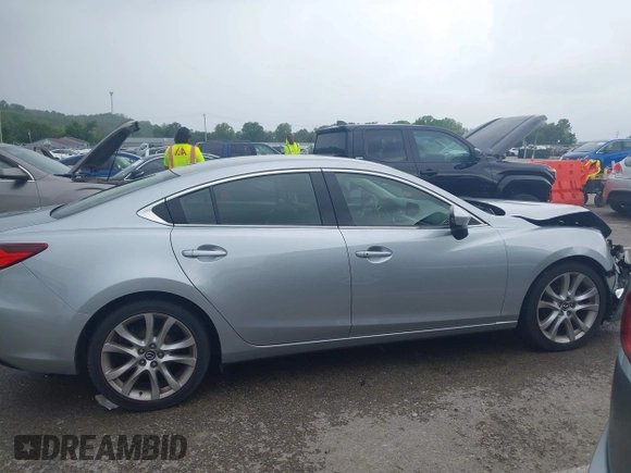 2016 Mazda 6 i Touring with VIN JM1GJ1V57G1434250, listed as a IAAI auction lot 42241857 with 68,011 mi miles and . Bid and sale history available at DreamBid. Image 13.
