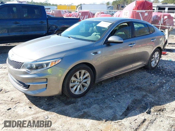 2016 Kia Optima EX with VIN 5XXGU4L3XGG052034, listed as a IAAI auction lot 41506088 with 87,509 mi miles and . Bid and sale history available at DreamBid. Image 2.