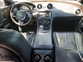 2014 Jaguar XJ Portfolio with VIN SAJWA2GZ2E8V66906, listed as a Copart auction lot 64888135 with 166,194 mi miles and Clean title. Bid and sale history available at DreamBid. Image 8.