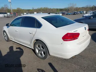 2013 Volkswagen Passat SE w/Sunroof & Nav with VIN 1VWBP7A32DC017647, listed as a IAAI auction lot 41991170 with 270,917 mi miles. Bid and sale history available at carsss.com. Image 3.