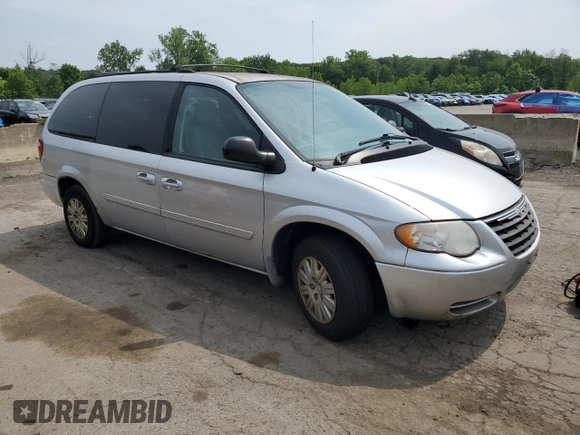 2007 Chrysler Town & Country LX z VIN 2A4GP44RX7R235204, wystawiony jako Copart lot #60727205 z przebiegiem 102 970 mil mil oraz Czysty tytuł • Clean title. Historia ofert i sprzedaży dostępna na DreamBid. Obrazek 4.