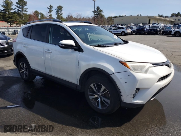 2018 Toyota RAV4 XLE with VIN 2T3WFREV4JW476959, listed as a Copart auction lot 51593265 with 198,596 mi miles and Salvage Title. Bid and sale history available at DreamBid. Image 4.