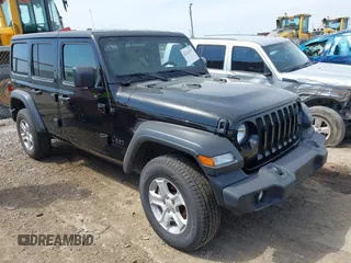 2023 Jeep Wrangler Sport S with VIN 1C4HJXDN6PW599895, listed as a IAAI auction lot 42242107 with 53,980 mi miles and . Bid and sale history available at DreamBid. Image 1.