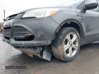 2015 Ford Escape SE with VIN 1FMCU9GX6FUC73272, listed as a IAAI auction lot 41966307 with 118,144 mi miles and . Bid and sale history available at DreamBid. Image 6.