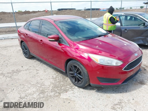 2017 Ford Focus SE z VIN 1FADP3F23HL313857, wystawiony jako IAAI lot #42181530 z przebiegiem 93 478 mil mil oraz . Historia ofert i sprzedaży dostępna na DreamBid. Obrazek 1.