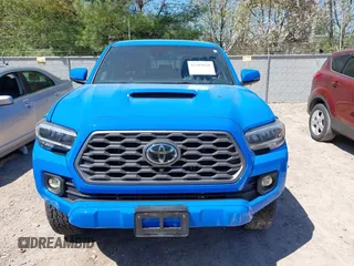 2020 Toyota Tacoma SR5 z VIN 3TMCZ5AN5LM337632, wystawiony jako IAAI lot #42203628 z przebiegiem 39 831 mil mil oraz . Historia ofert i sprzedaży dostępna na DreamBid. Obrazek 12.