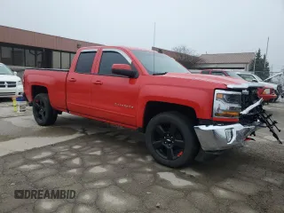2018 Chevrolet Silverado 1500 LT with VIN 1GCVKREC5JZ325988, listed as a Copart auction lot 52478535 with 57,258 mi miles and Salvage Title. Bid and sale history available at DreamBid. Image 4.