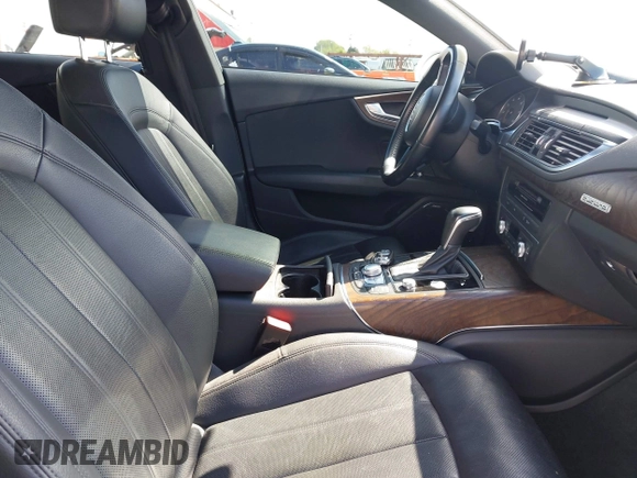 2016 Audi A7 Prestige with VIN WAU2GAFC1GN158272, listed as a IAAI auction lot 42012170 with 99,775 mi miles and . Bid and sale history available at DreamBid. Image 5.
