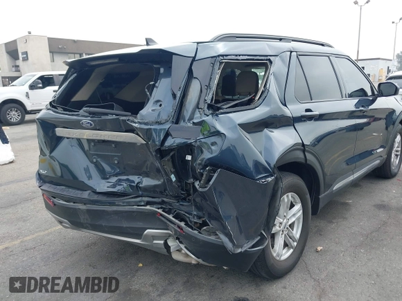 2022 Ford Explorer XLT z VIN 1FMSK7DH4NGB75826, wystawiony jako IAAI lot #42443067 z przebiegiem 85 806 mil mil oraz . Historia ofert i sprzedaży dostępna na DreamBid. Obrazek 6.