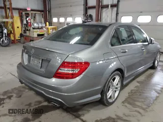 2014 Mercedes-Benz C-Class C 300 Sport with VIN WDDGF8AB5EA954097, listed as a IAAI auction lot 41441443 with 100,074 mi miles. Bid and sale history available at carsss.com. Image 4.