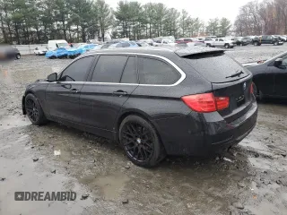 2014 BMW 3 Series 328d xDrive with VIN WBA3K5C59EKT33057, listed as a Copart auction lot 82470424 with 157,288 mi miles and Salvage title. Bid and sale history available at DreamBid. Image 2.