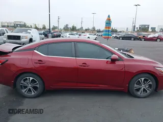 2022 Nissan Sentra SV z VIN 3N1AB8CV7NY268158, wystawiony jako IAAI lot #42355360 z przebiegiem 23 940 mil mil oraz . Historia ofert i sprzedaży dostępna na DreamBid. Obrazek 13.