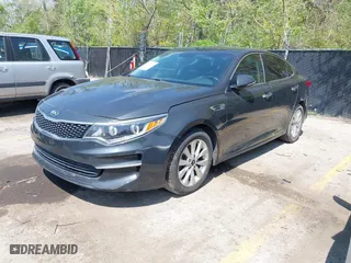 2016 Kia Optima EX with VIN 5XXGU4L38GG022501, listed as a IAAI auction lot 42071944 with 122,502 mi miles. Bid and sale history available at carsss.com. Image 2.