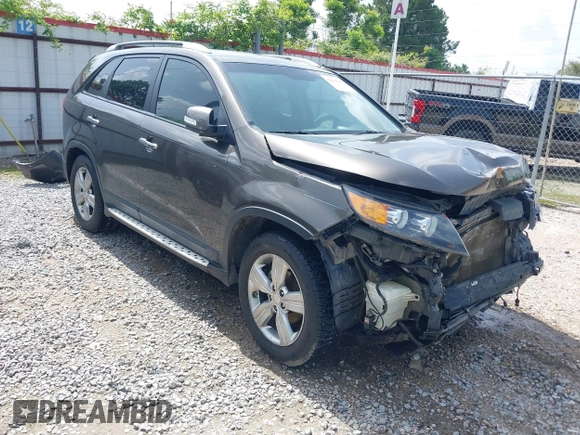 2012 Kia Sorento EX with VIN 5XYKU4A69CG276943, listed as a IAAI auction lot 42604286 with 182,425 mi miles and . Bid and sale history available at DreamBid. Image 1.