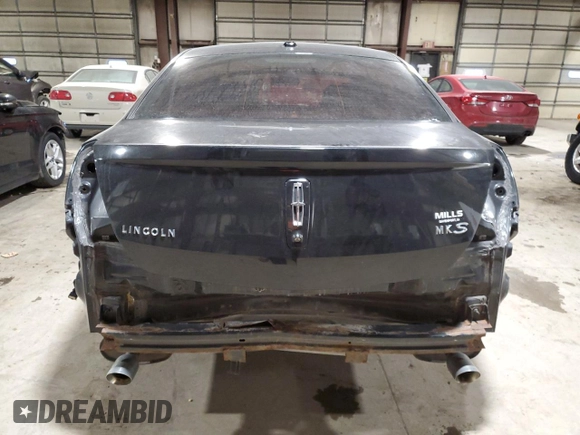 2013 Lincoln MKS with VIN 1LNHL9DK6DG606079, listed as a Copart auction lot 87322174 with 133,383 mi miles and Salvage Title. Bid and sale history available at DreamBid. Image 6.