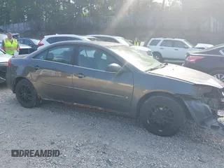 2006 Pontiac G6 1SV with VIN 1G2ZF55B164160326, listed as a IAAI auction lot 42582002 with 141,315 mi miles and . Bid and sale history available at DreamBid. Image 14.