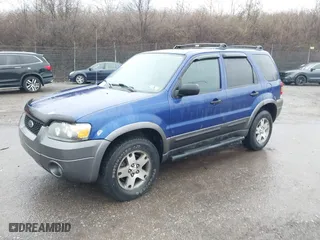 2005 Ford Escape XLT with VIN 1FMYU931X5KA28279, listed as a IAAI auction lot 41861060 with 173,999 mi miles. Bid and sale history available at carsss.com. Image 2.
