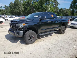 2018 Toyota Tundra SR with VIN 5TFUM5F14JX078695, listed as a Copart auction lot 61400035 with 100,121 mi miles and Salvage title. Bid and sale history available at DreamBid. Image 1.