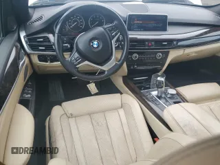 2017 BMW X5 xDrive35i with VIN 5UXKR0C56H0V68771, listed as a Copart auction lot 59587015 with 164,990 mi miles and Salvage title. Bid and sale history available at DreamBid. Image 8.