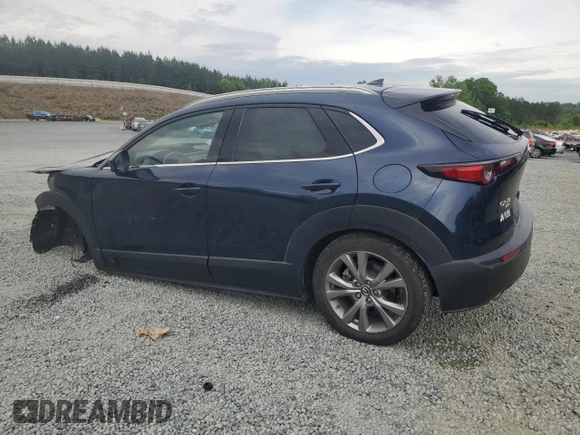 2022 Mazda CX-30 S Premium with VIN 3MVDMBDLXNM416419, listed as a Copart auction lot 54128265 with 54,838 mi miles and Salvage title. Bid and sale history available at DreamBid. Image 2.