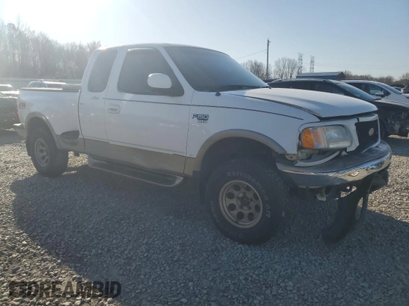 2001 Ford F-150 XL z VIN 2FTRX08LX1CB01820, wystawiony jako Copart lot #48785635 z przebiegiem 334 615 mil mil oraz Szkoda całkowita • Salvage title. Historia ofert i sprzedaży dostępna na DreamBid. Obrazek 4.