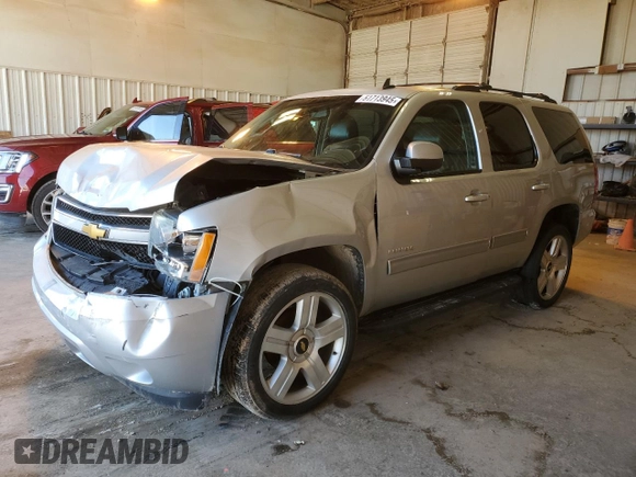 2013 Chevrolet Tahoe LS with VIN 1GNSCAE07DR335358, listed as a Copart auction lot 51713945 with 186,906 mi miles and Salvage title. Bid and sale history available at DreamBid. Image 1.