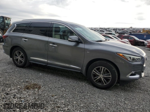 2016 Infiniti QX60 with VIN 5N1AL0MN1GC521167, listed as a Copart auction lot 82646074 with 111,293 mi miles and Salvage Title. Bid and sale history available at carsss.com. Image 4.