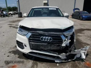 2017 Audi Q3 Premium with VIN WA1BCCFS7HR014683, listed as a Copart auction lot 54739465 with 64,917 mi miles and Salvage title. Bid and sale history available at DreamBid. Image 5.