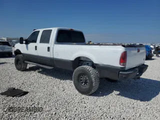 2000 Ford Super Duty F-250 XL with VIN 1FTNW21SXYEA52699, listed as a Copart auction lot 78659054 with 154,056 mi miles and Salvage Title. Bid and sale history available at carsss.com. Image 2.