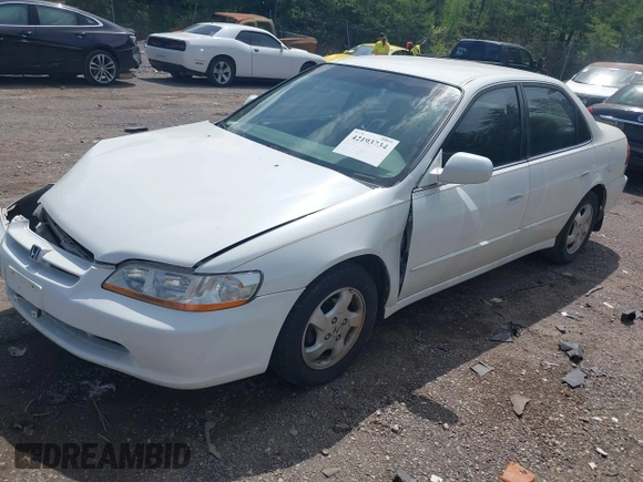 1999 Honda Accord LX z VIN JHMCG5643XC000176, wystawiony jako IAAI lot #42193734 z przebiegiem 261 485 mil mil oraz . Historia ofert i sprzedaży dostępna na DreamBid. Obrazek 2.