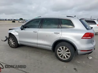2016 Volkswagen Touareg Sport z VIN WVGEF9BP8GD010468, wystawiony jako Copart lot #53109665 z przebiegiem 55 296 mil mil oraz Szkoda całkowita • Salvage title. Historia ofert i sprzedaży dostępna na DreamBid. Obrazek 2.