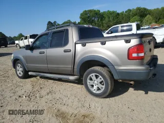 2007 Ford Explorer Sport Trac XLT z VIN 1FMEU31K77UA13757, wystawiony jako Copart lot #53308795 z przebiegiem 205 761 mil mil oraz Czysty tytuł • Clean title. Historia ofert i sprzedaży dostępna na DreamBid. Obrazek 2.