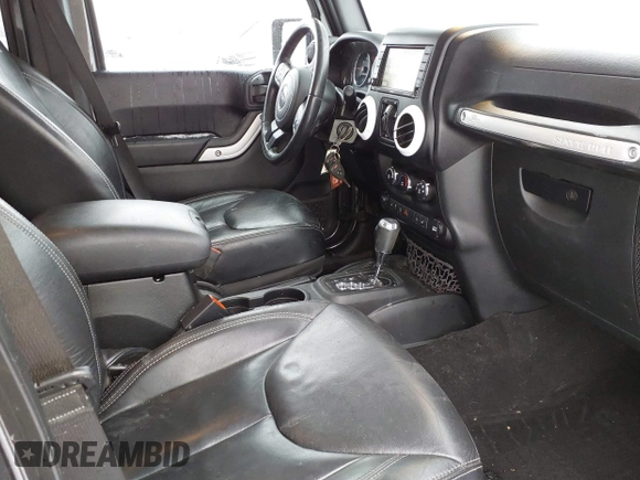 2017 Jeep Wrangler Unlimited Sahara with VIN 1C4BJWEG4HL591149, listed as a IAAI auction lot 41542157 with 70,630 mi miles. Bid and sale history available at carsss.com. Image 5.