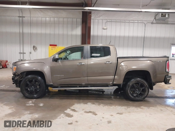 2016 GMC Canyon 4WD SLT z VIN 1GTP6DE13G1229783, wystawiony jako IAAI lot #41583360 z przebiegiem 80 149 mil mil oraz . Historia ofert i sprzedaży dostępna na DreamBid. Obrazek 15.