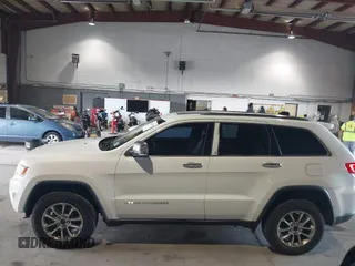2014 Jeep Grand Cherokee Limited with VIN 1C4RJFBG6EC545840, listed as a IAAI auction lot 40142948 with 167,353 mi miles. Bid and sale history available at carsss.com. Image 14.