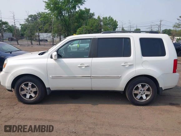 2011 Honda Pilot Touring z VIN 5FNYF4H9XBB003469, wystawiony jako IAAI lot #42369323 z przebiegiem 201 958 mil mil oraz . Historia ofert i sprzedaży dostępna na DreamBid. Obrazek 14.