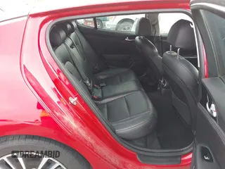 2019 Kia Stinger with VIN KNAE15LA1K6056093, listed as a IAAI auction lot 41620911 with 99,295 mi miles and . Bid and sale history available at DreamBid. Image 8.