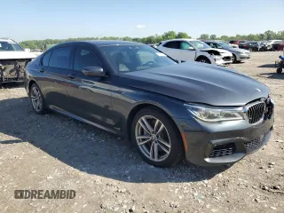 2016 BMW 7 Series 750i xDrive с VIN WBA7F2C56GG417976, выставлен на аукционе Copart как лот 55976095 с пробегом 113 753 миль миль и Списание • Salvage title. История ставок и продаж доступна на DreamBid. Изображение 4.