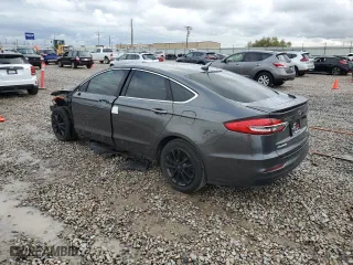 2020 Ford Fusion Plug-In Hybrid Titanium with VIN 3FA6P0SU1LR158590, listed as a Copart auction lot 76422084 with 69,553 mi miles and Salvage Title. Bid and sale history available at carsss.com. Image 2.