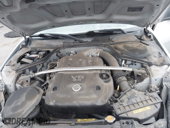 2006 Nissan 350Z Touring with VIN JN1AZ36A36M450659, listed as a IAAI auction lot 42034870 with 77,544 mi miles. Bid and sale history available at carsss.com. Image 10.